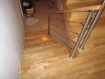 Rampe d'escalier en inox avec main courante bois